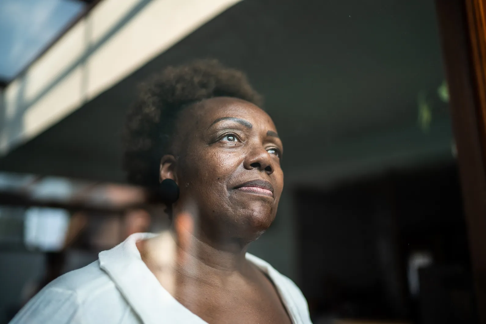 Woman looking out a window