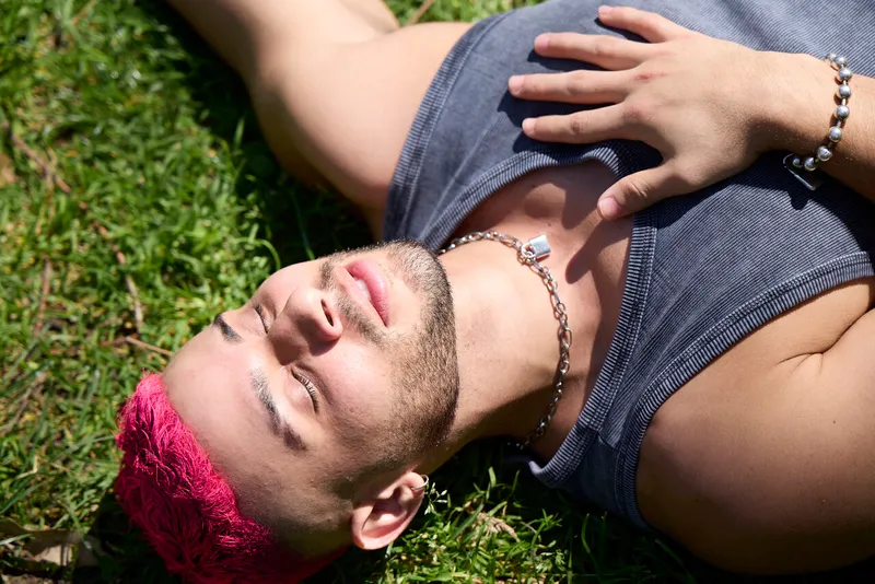 a person lying on grass