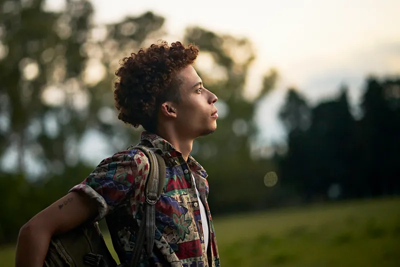 Man looking up while outside